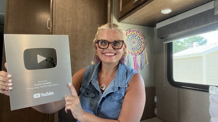 Kristin Omdahl YouTube Silver Award inside of RV